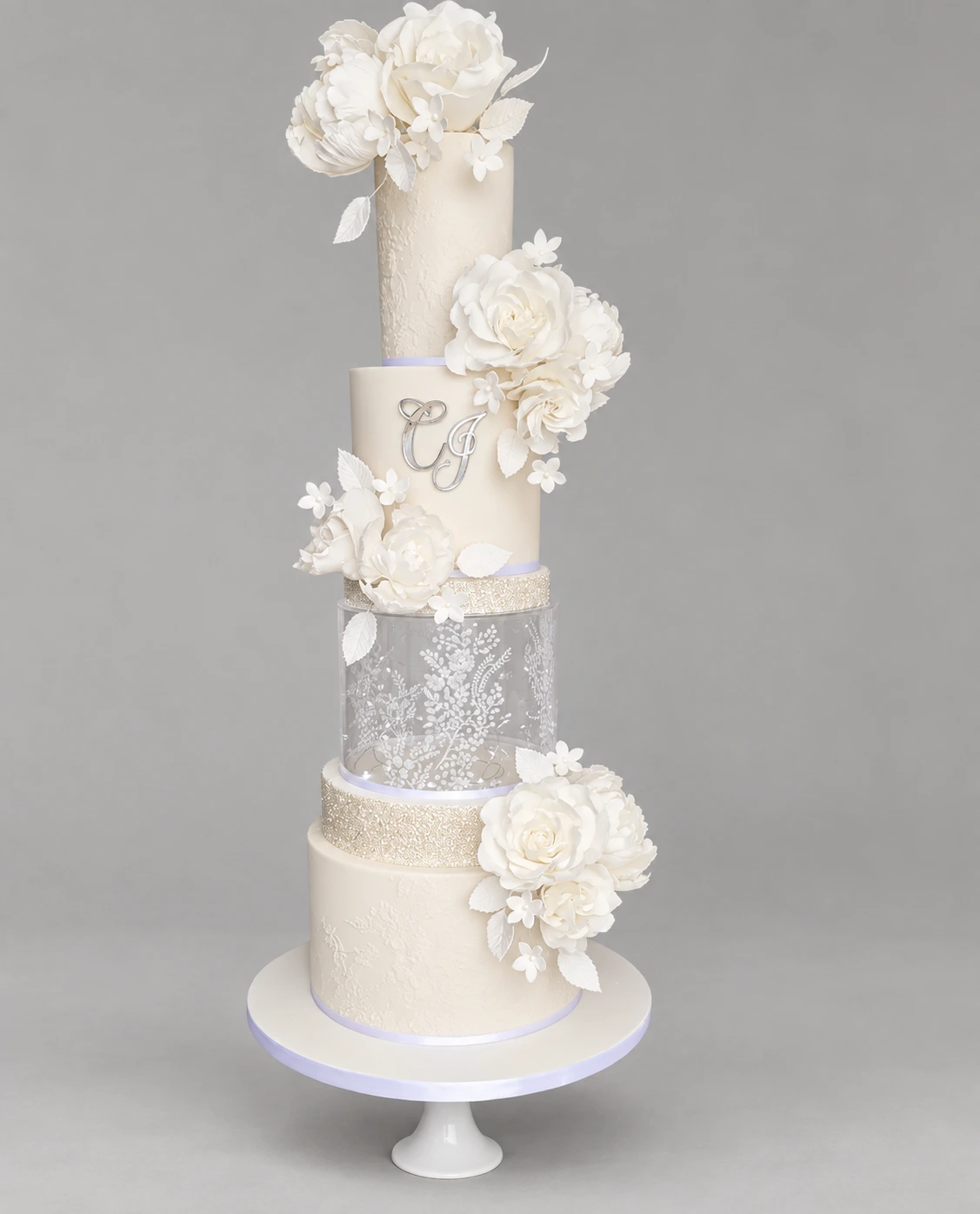 White Florals & Clear Separator Wedding Cake — 3 cake tiers